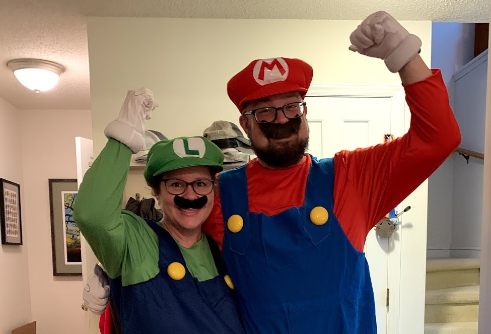 Mike and wife dressed as Mario and Luigi