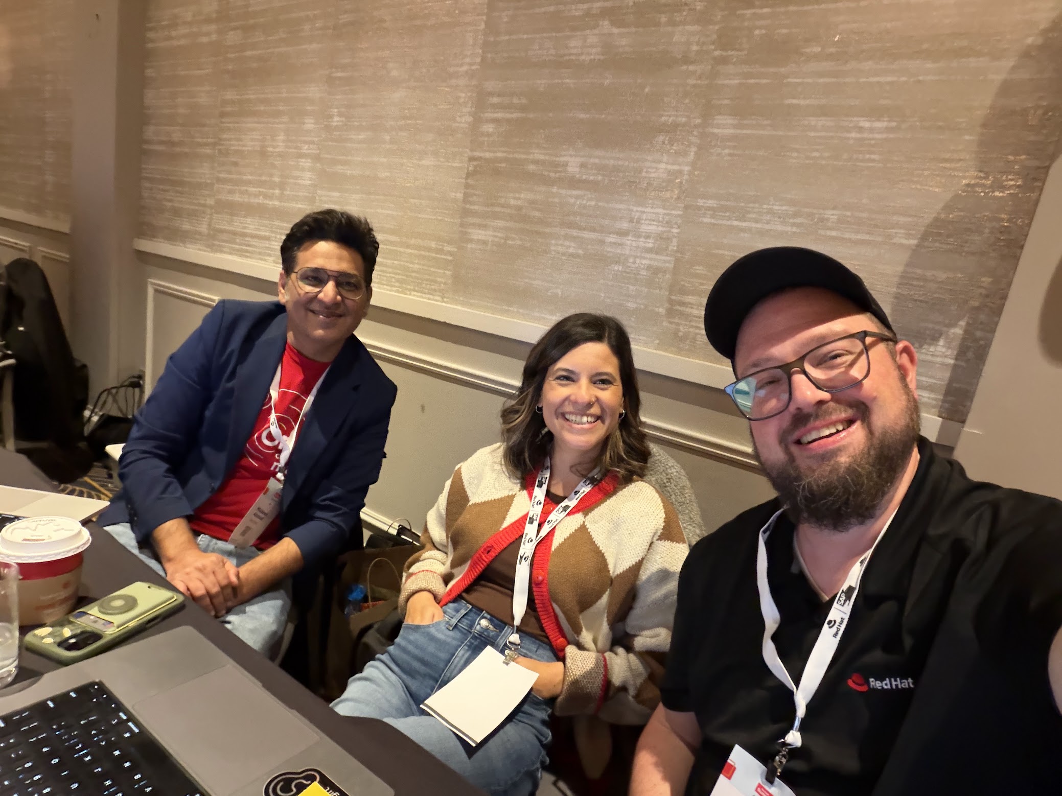 Mike with the Red Hat team at a conference