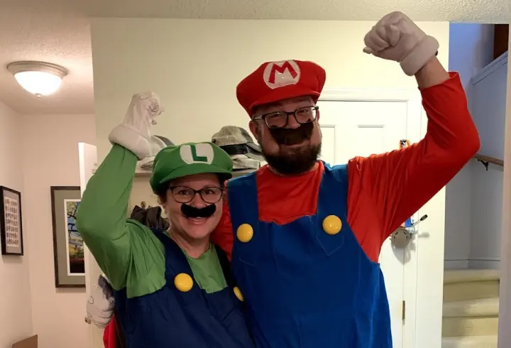 Mike and family dressed as Mario and Luigi